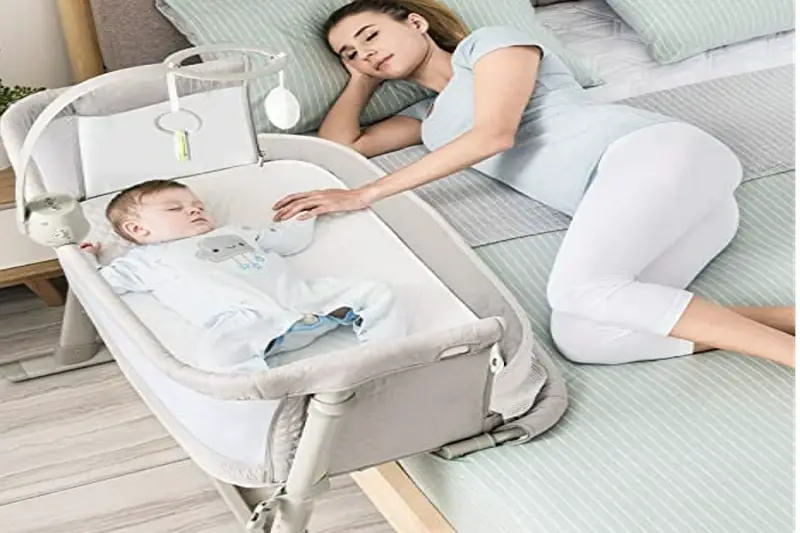 3 consigli e modi per far dormire un bambino in una culla di notte